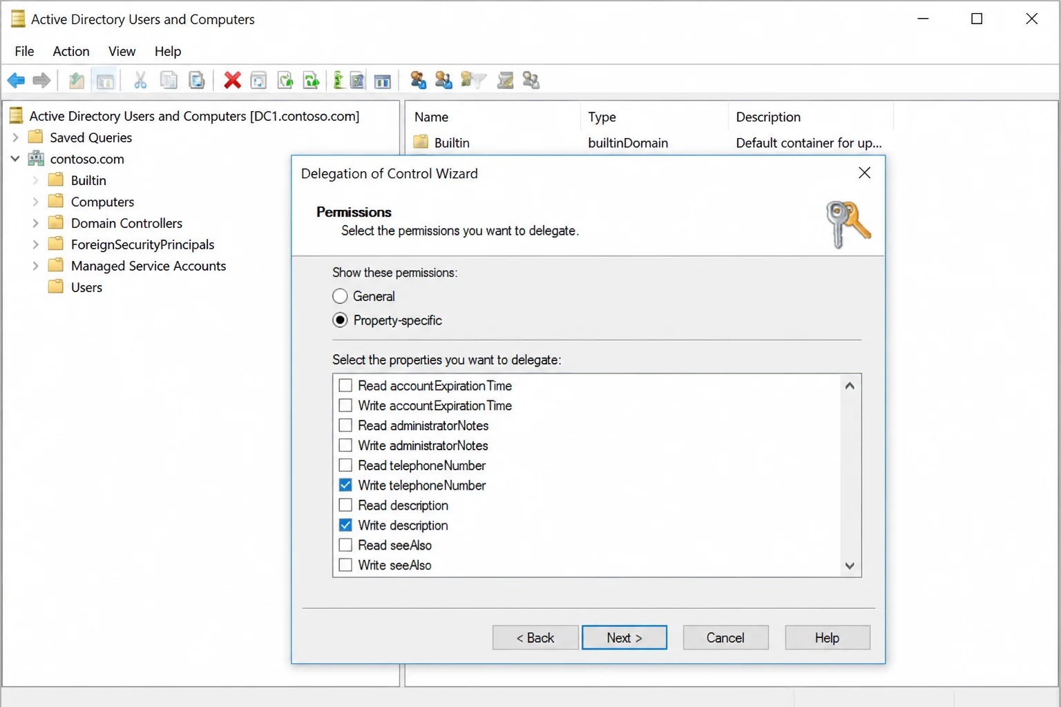Delegation of Control Wizard custom task permissions screen with Property-specific selected and Write telephoneNumber and Write description checked, other properties unchecked